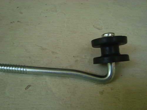 Corner wood post bracket assembly. Bracket, Locknut with nylon insert and Insulator bobbin.